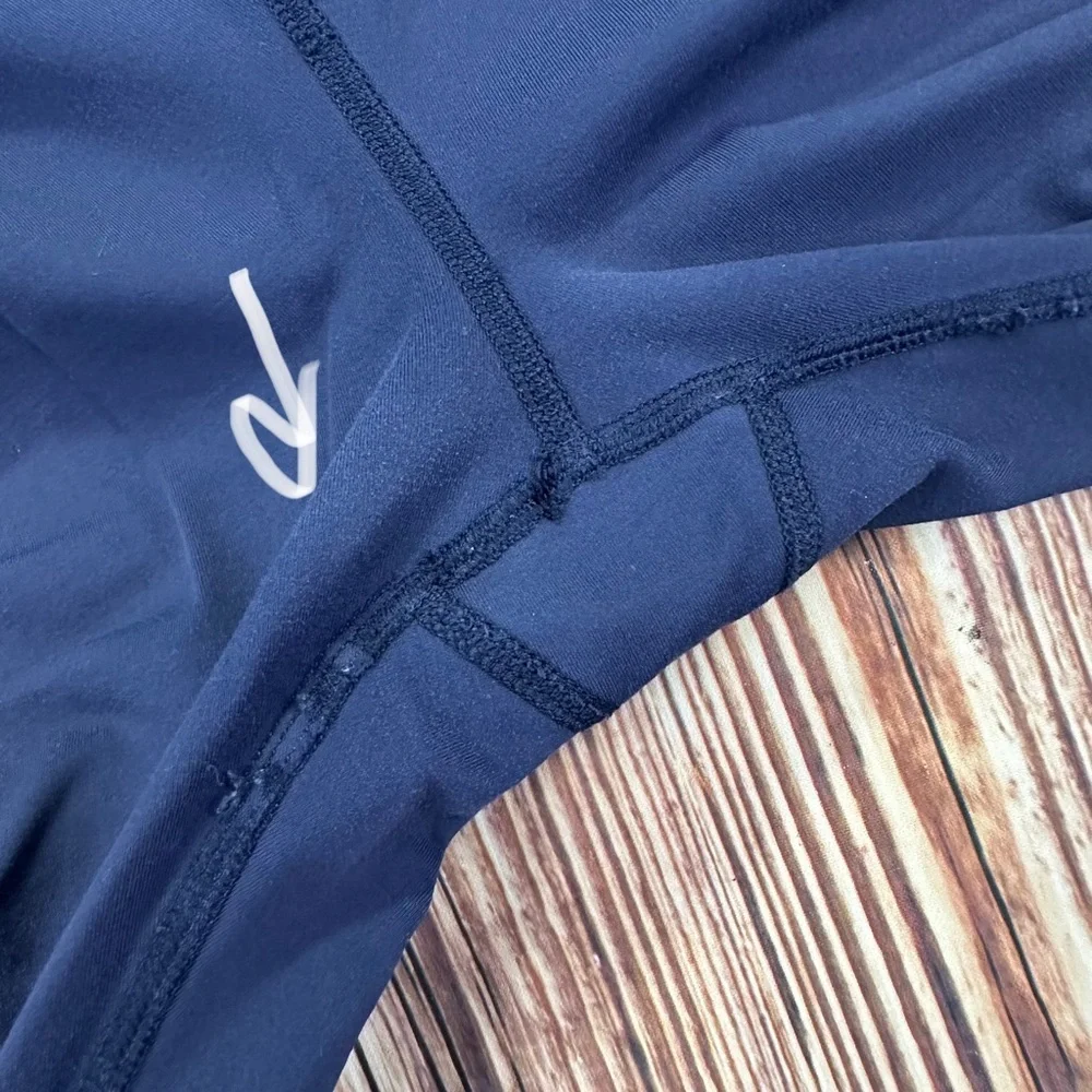 Lululemon Dark Navy ,colorful waist ban and slightly cropped leggings Size 8.